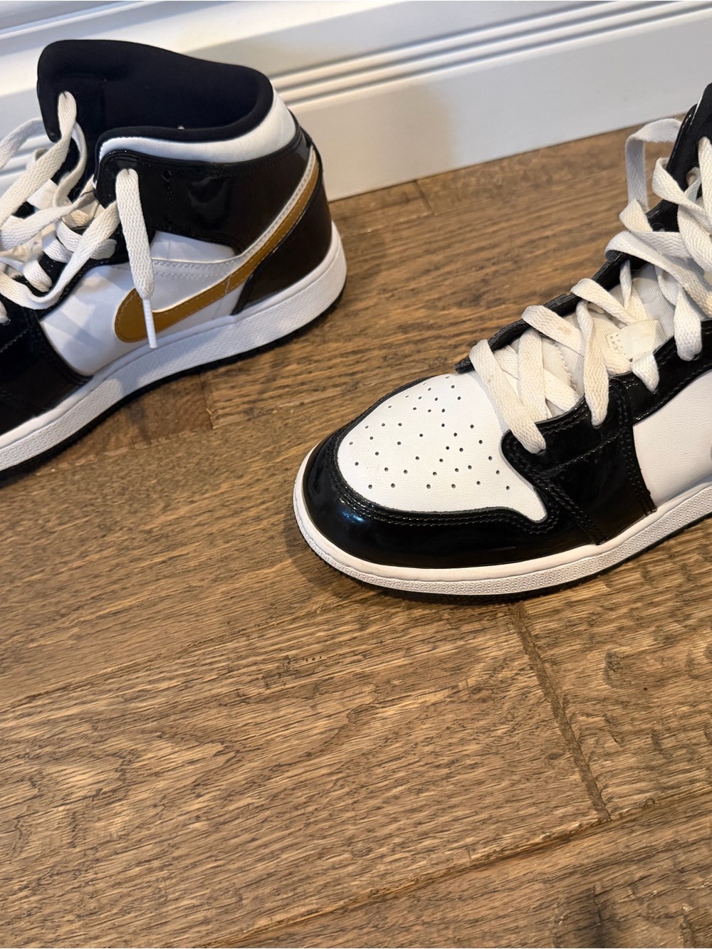 Air Jordan 1 High-Top Sneakers in Black Patent & Gold